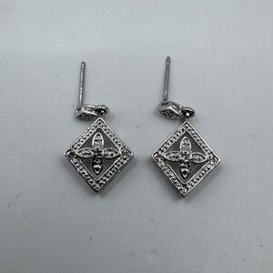 Handmade 10k gold earrings with diamonds.Covered with rhodium.